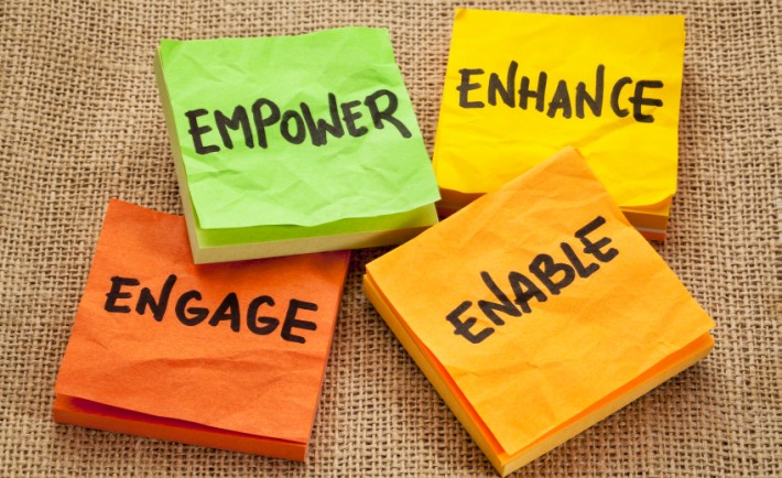 empower, enhance, enable and engage - business motivation concept -  handwriting on sticky notes